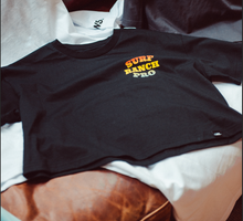 Carregar imagem no visualizador da galeria, Womens Official 2023 Surf Ranch Pro Crop Tee